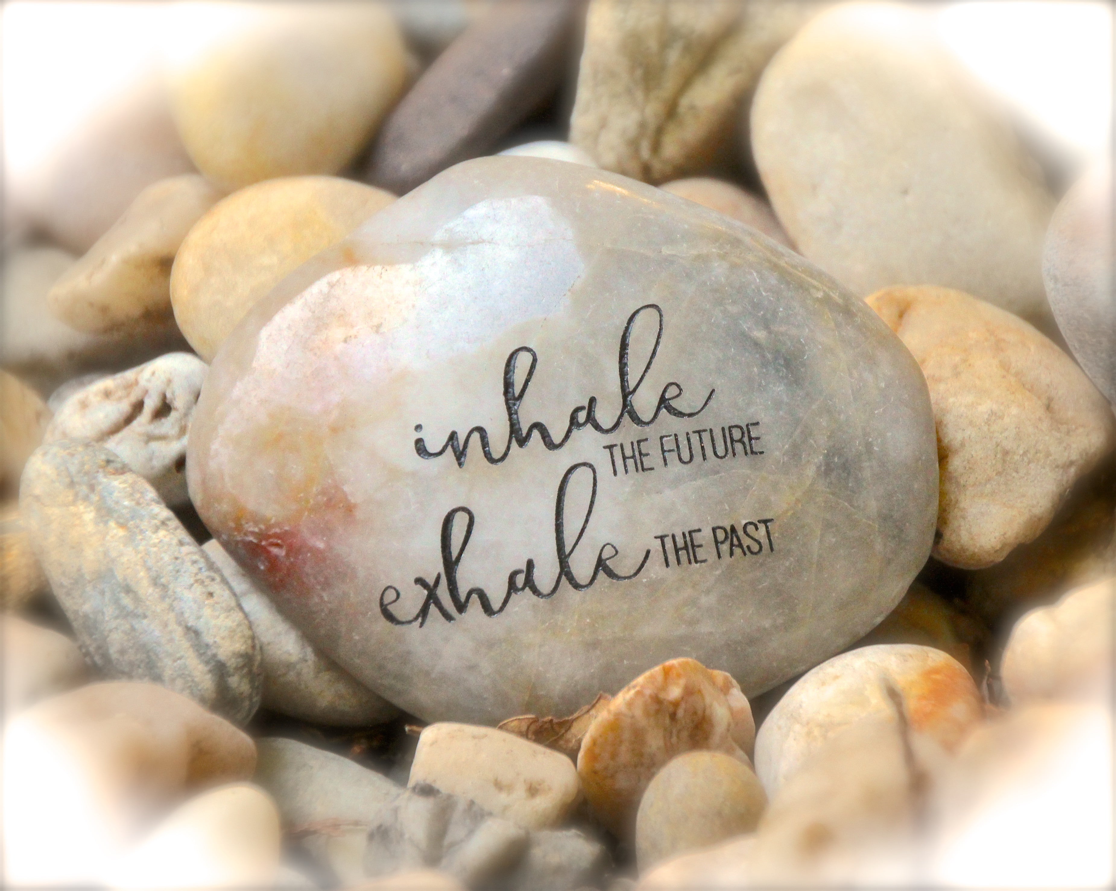 Inhale_the_future_exhale_the_past_engraved_rock_karmic_stones
